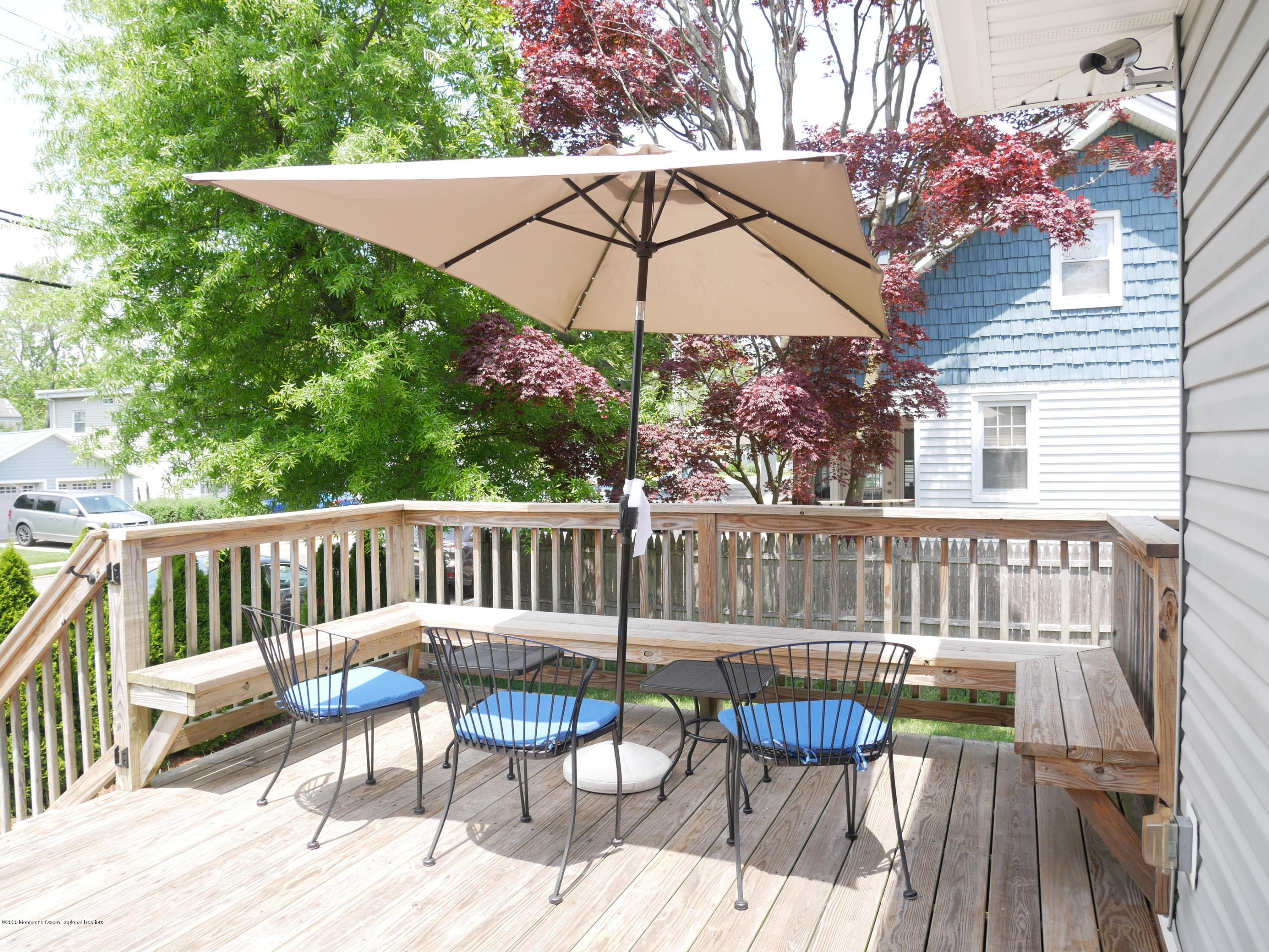 319 Arnold Avenue Point Pleasant Beach, NJ 08742 - Photo 31 of 34 a view of a chair and table on the deck