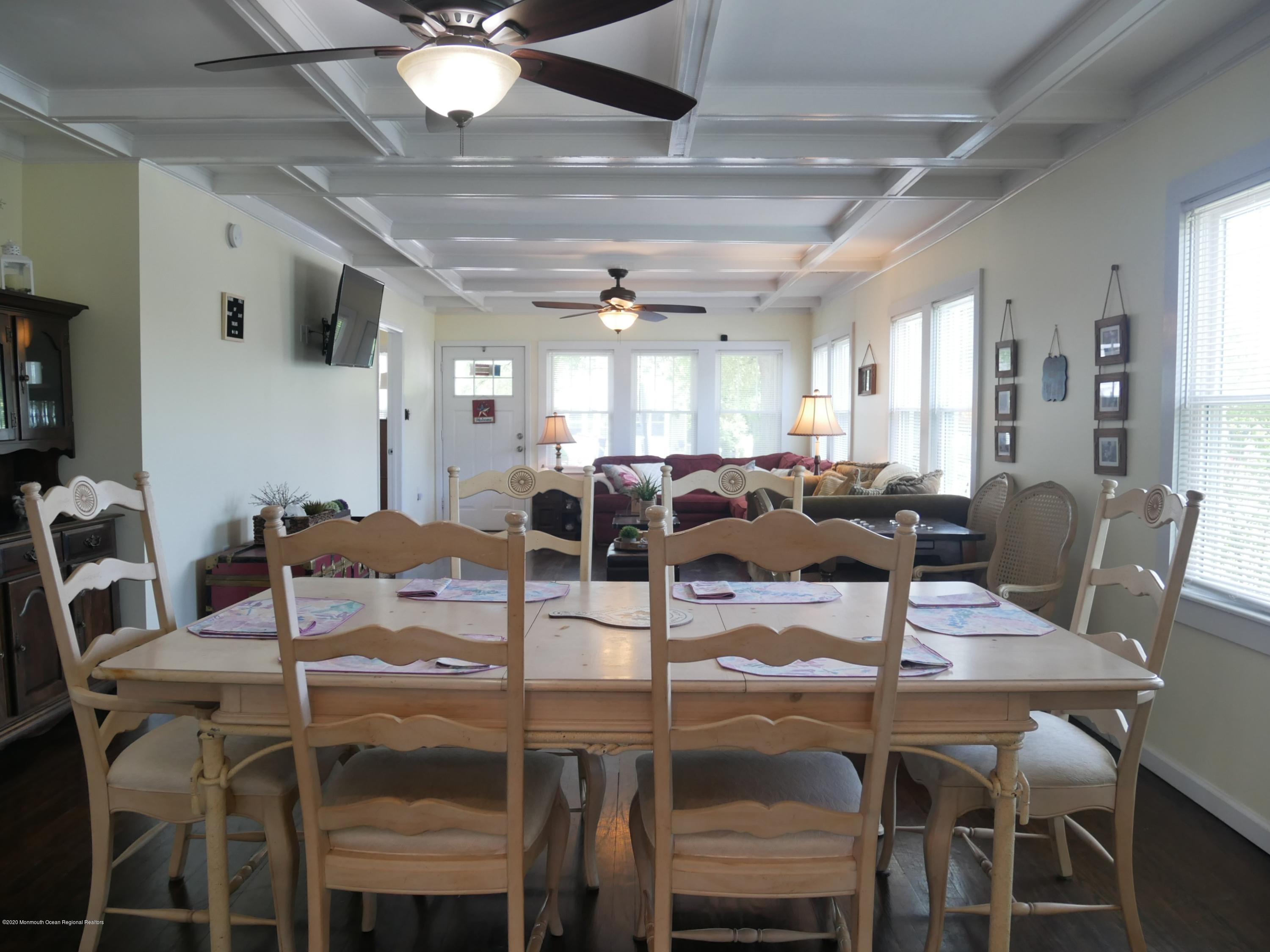 319 Arnold Avenue Point Pleasant Beach, NJ 08742 - Photo 5 of 34 a view of a dining room with furniture and a chandelier