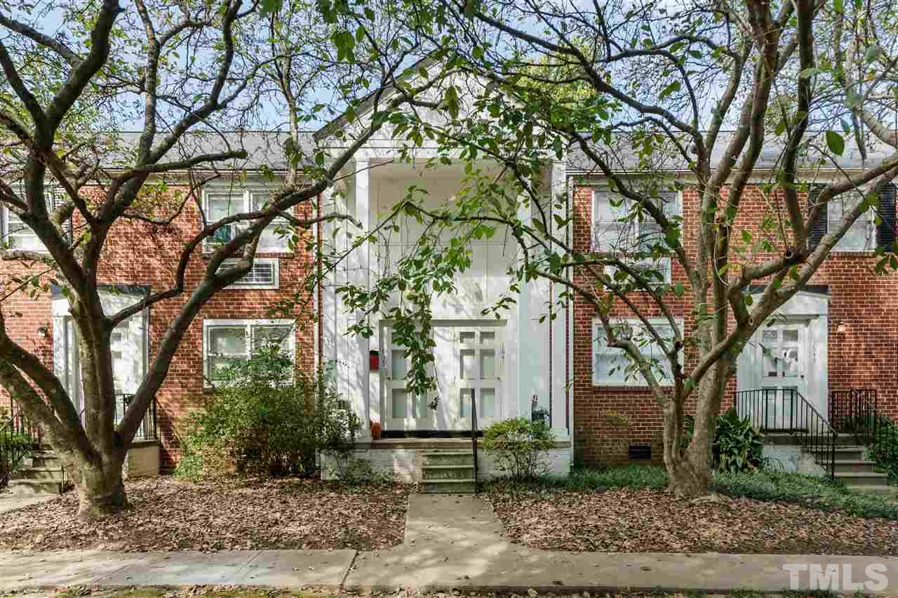 1641 Sutton Drive, Unit 3 Raleigh, NC 27605 - Photo 2 of 19 a front view of a house with a tree