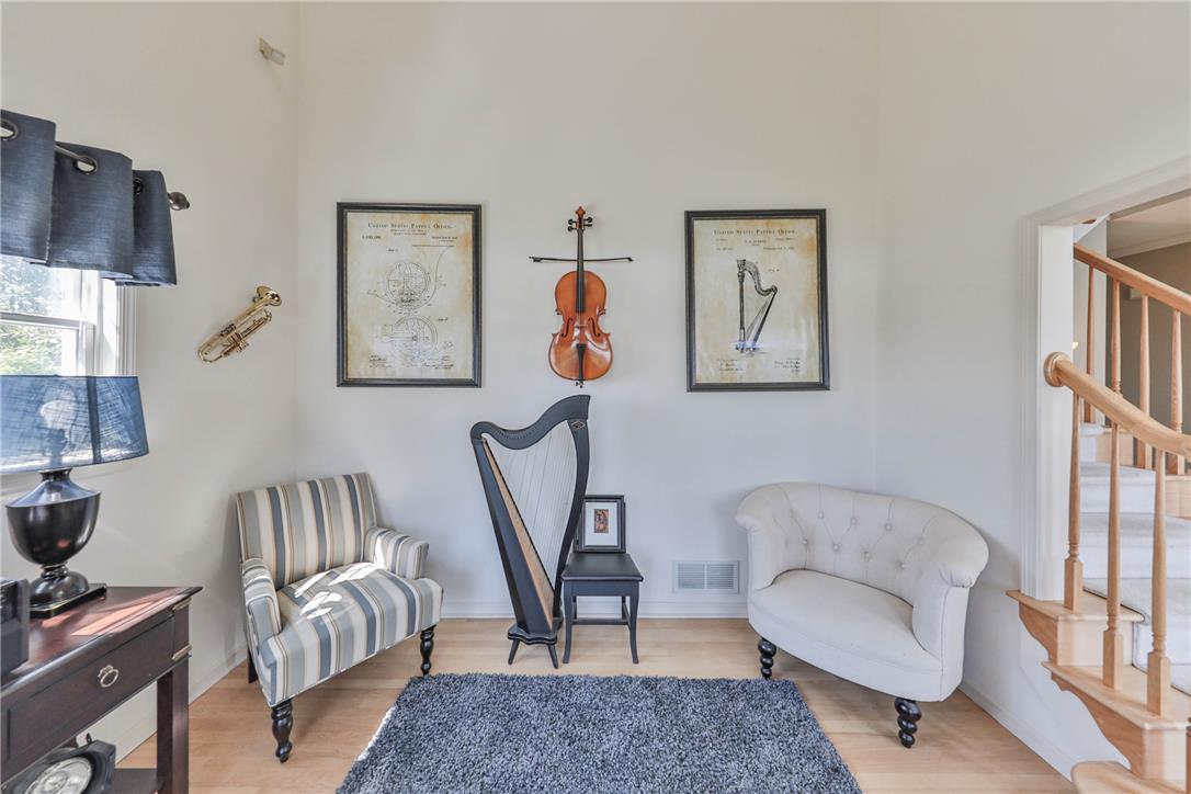 63 Long Road Lenhartsville, PA 19534 - Photo 30 of 100 High ceilings and warm wood flooring create an inviting atmosphere in this versatile living space.