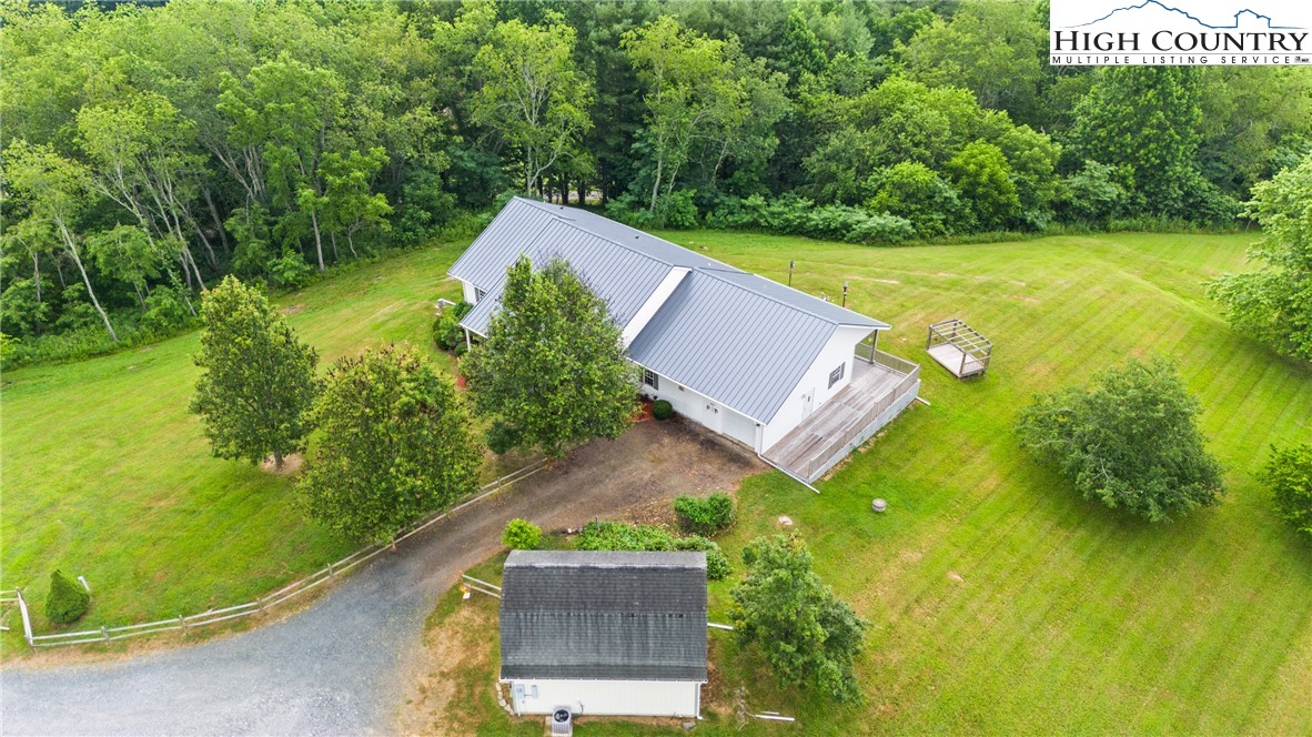 175 Olive Ridge Drive Crumpler, NC 28617 - Photo 3 of 50 a view of a yard with a house