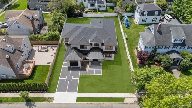 an aerial view of a house with a garden