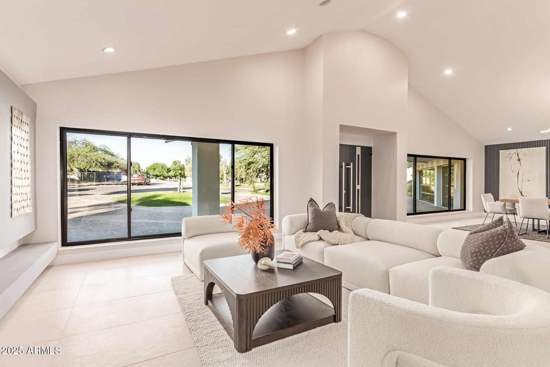 3301 East Rovey Avenue Paradise Valley, AZ 85253 - Photo 13 of 105 a living room with furniture and a large window