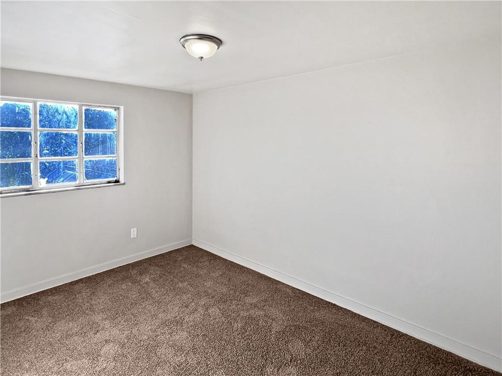 6444 Apple Street Pittsburgh, PA 15206 - Photo 13 of 28 a view of an empty room with a window