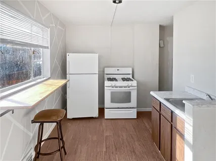 a utility room with washer and dryer