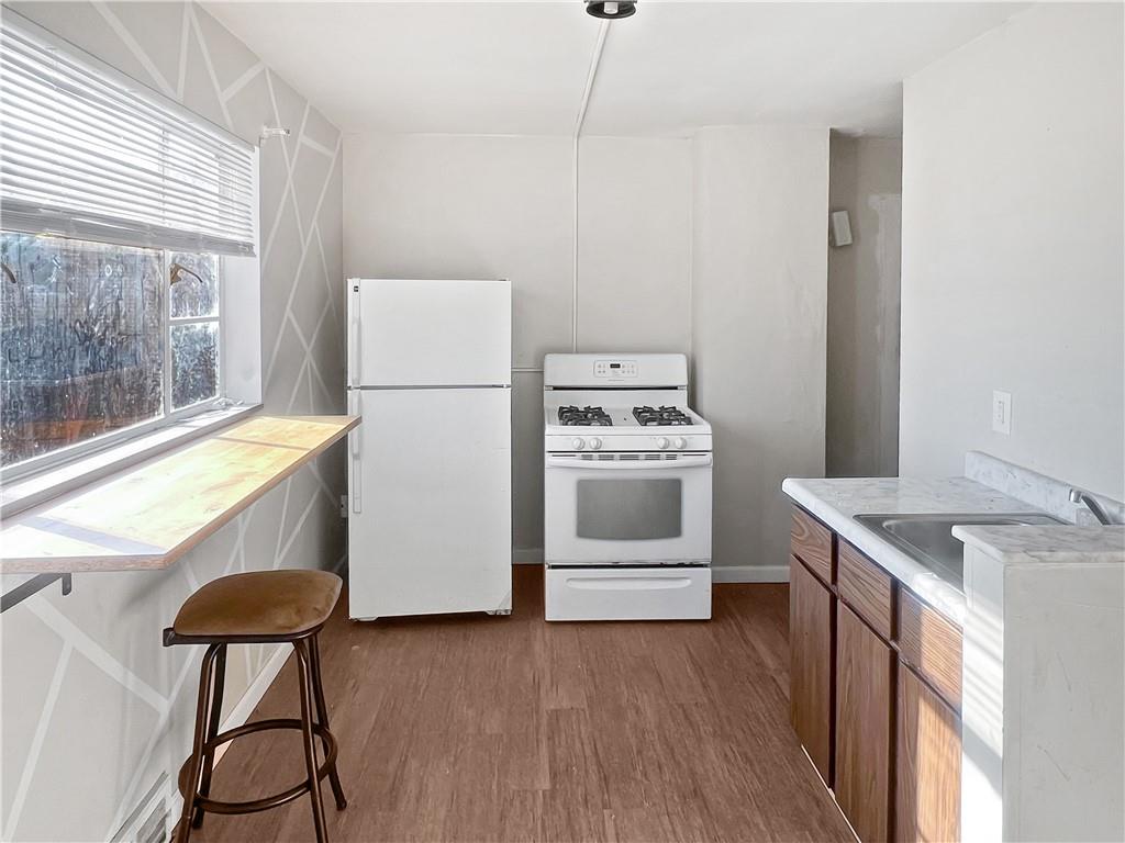 6444 Apple Street Pittsburgh, PA 15206 - Photo 17 of 28 a utility room with washer and dryer