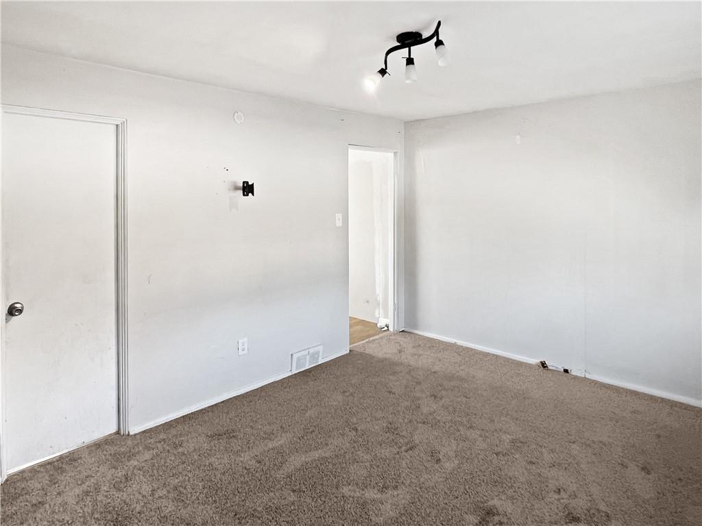 6444 Apple Street Pittsburgh, PA 15206 - Photo 20 of 28 wooden floor in an empty room