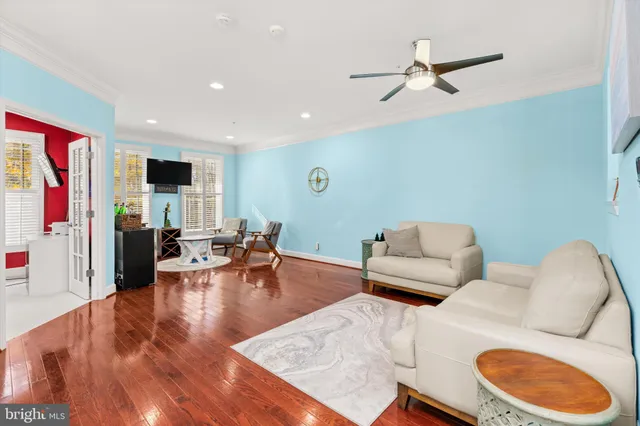 a kitchen with stainless steel appliances a sink stove and cabinets