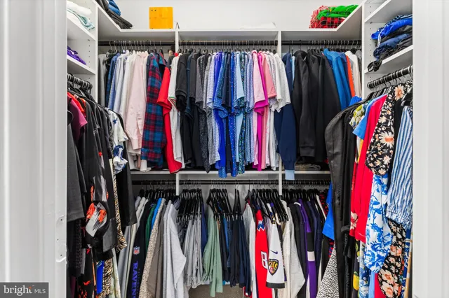 an aerial view of residential house with outdoor space and swimming pool