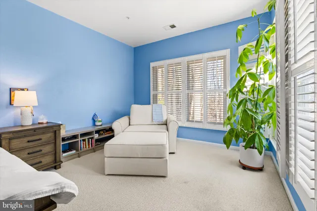 an aerial view of residential house with outdoor space and swimming pool