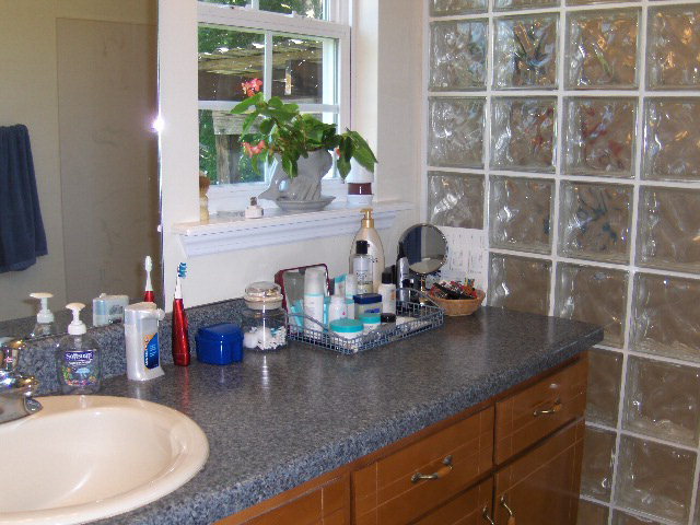 174 Buck Road Gray, GA 31032 - Photo 15 of 25 a kitchen with a sink and a potted plant
