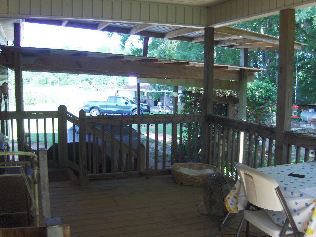 174 Buck Road Gray, GA 31032 - Photo 18 of 25 a view of a patio with a table chairs and a porch