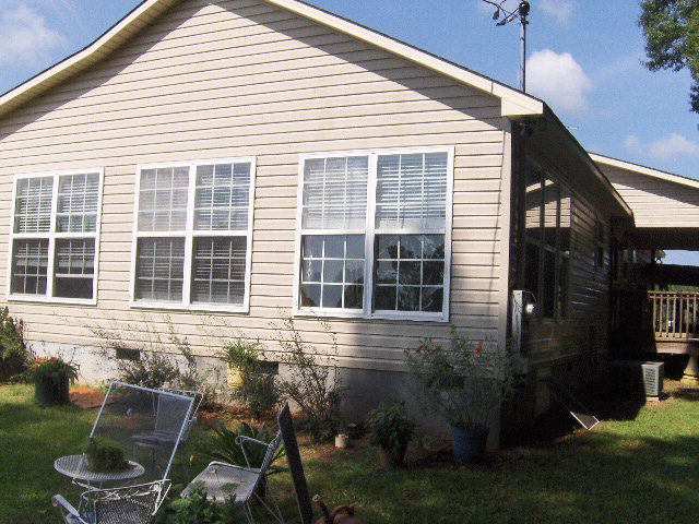 174 Buck Road Gray, GA 31032 - Photo 19 of 25 a front view of a house with a yard
