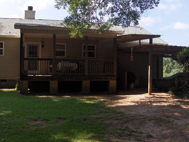 174 Buck Road Gray, GA 31032 - Photo 20 of 25 a view of a house with a yard