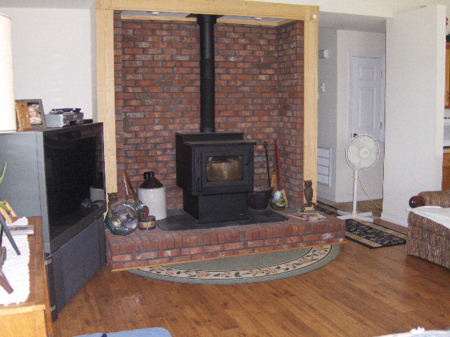 174 Buck Road Gray, GA 31032 - Photo 4 of 25 a living room with furniture and a fireplace