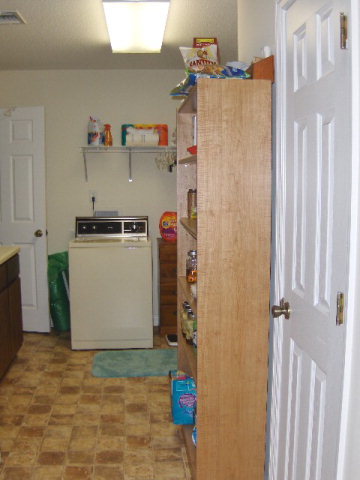 174 Buck Road Gray, GA 31032 - Photo 7 of 25 a utility room with a refrigerator and washer