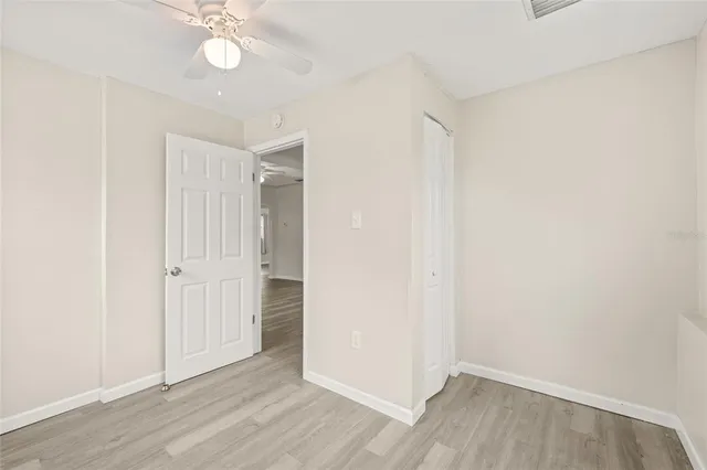 a bathroom with a toilet sink and a mirror