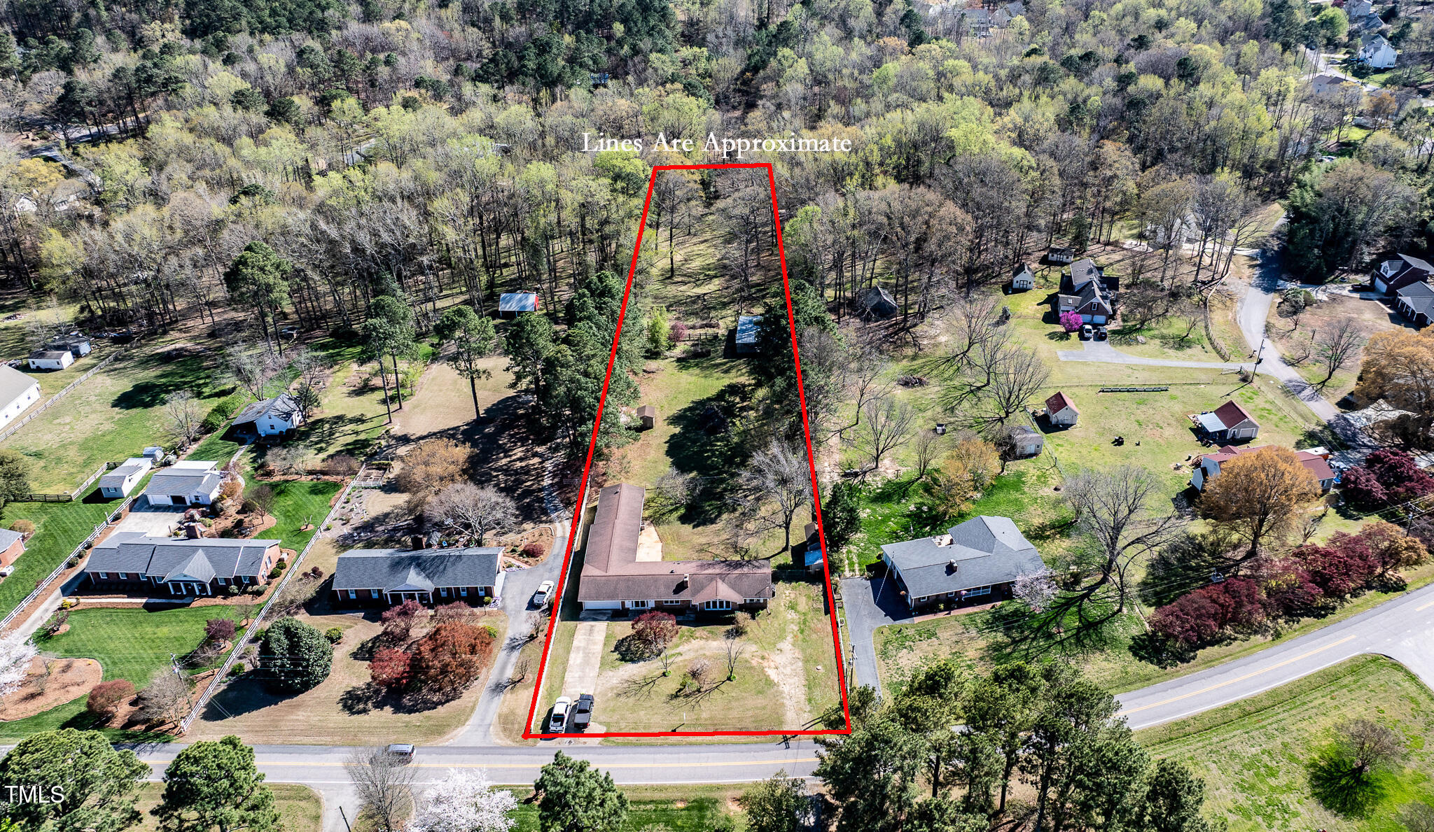 408 Rand Road Raleigh, NC 27603 - Photo 45 of 60 an aerial view of multiple houses with yard