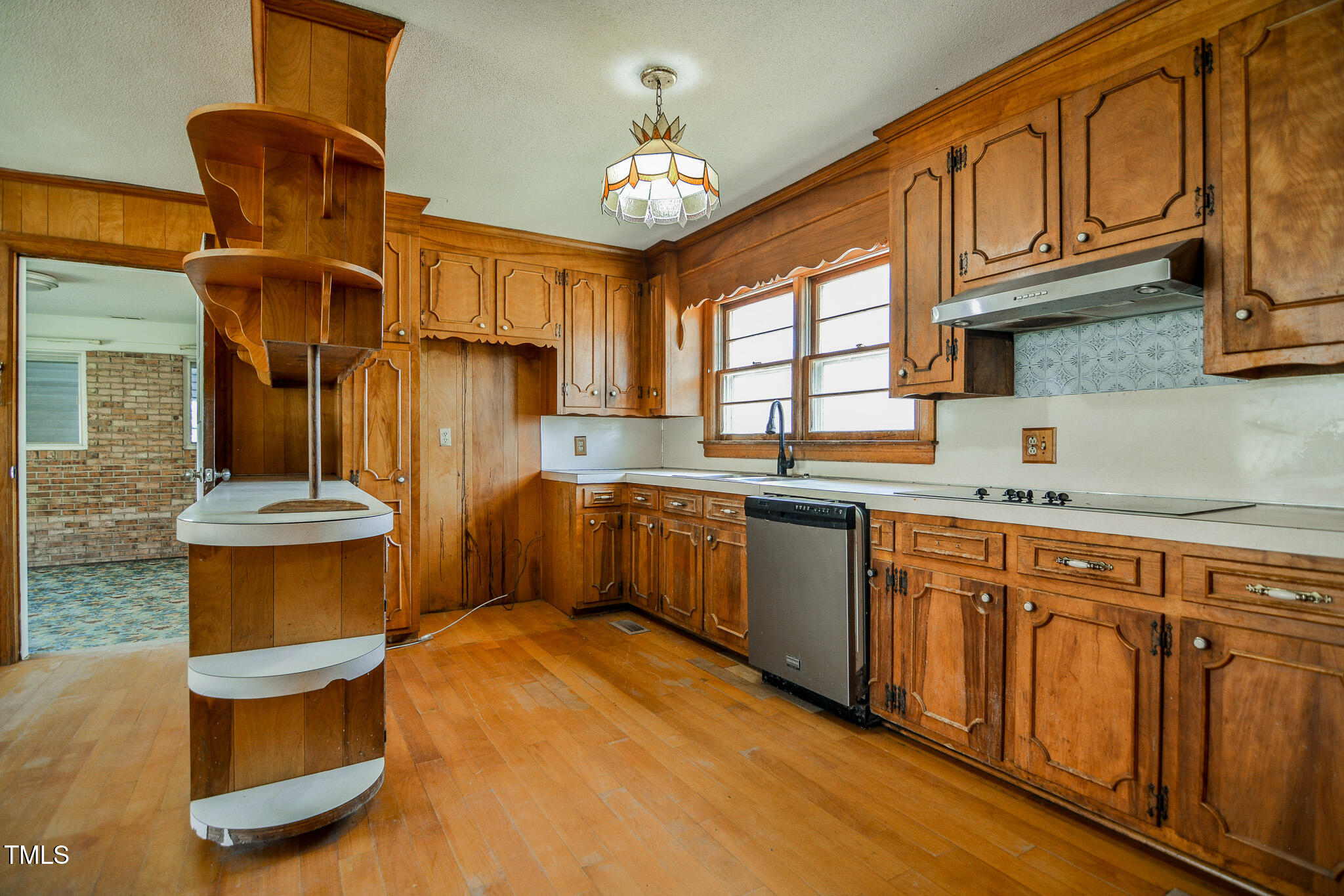 408 Rand Road Raleigh, NC 27603 - Photo 50 of 60 a kitchen with cabinets a sink and appliances