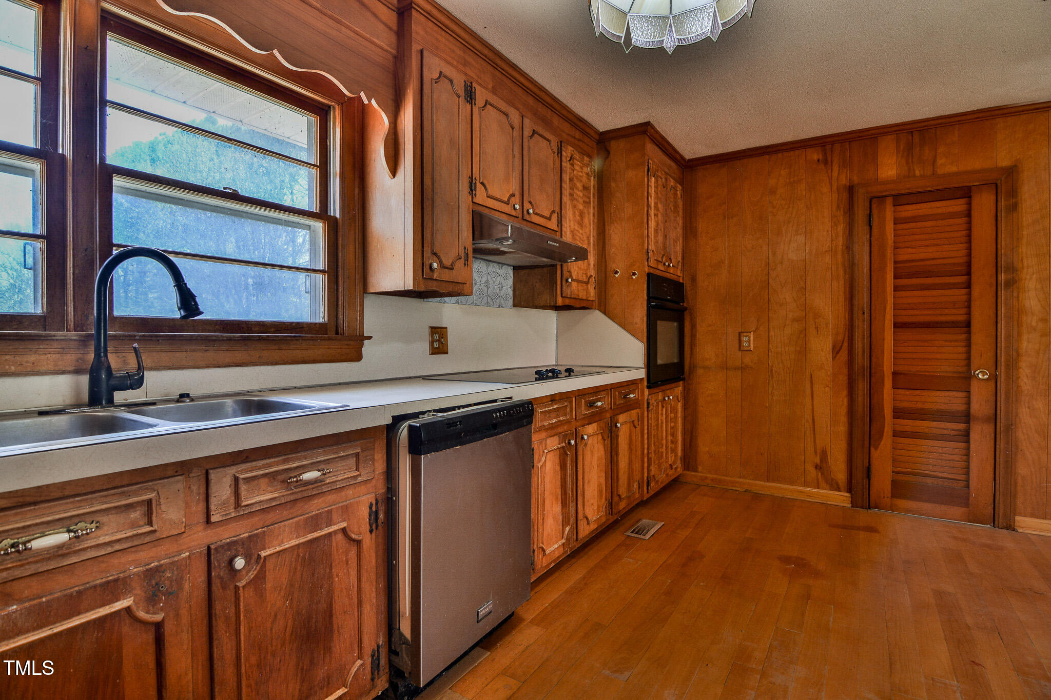 408 Rand Road Raleigh, NC 27603 - Photo 54 of 60 a kitchen with stainless steel appliances granite countertop a sink and cabinets