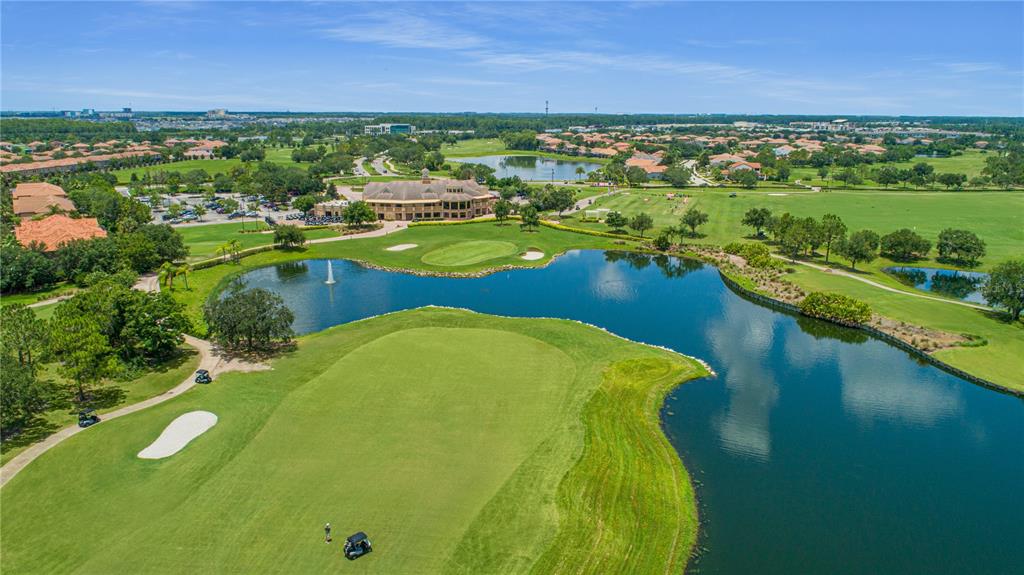 13969 Arclid Street Orlando, FL 32832 - Photo 28 of 29 a view of a lake with houses