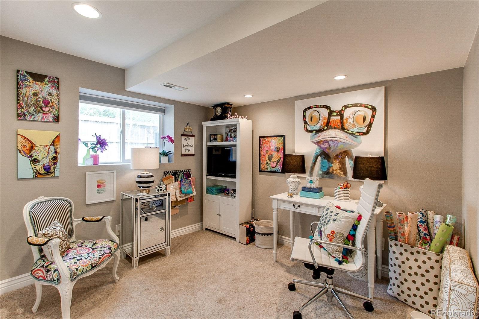 8028 Chaparral Road Lone Tree, CO 80124 - Photo 29 of 40 a view of a workspace with furniture and toys
