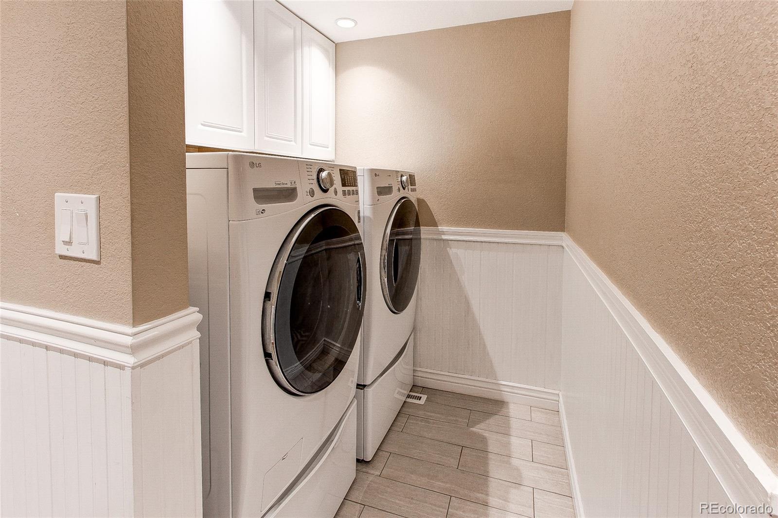 8028 Chaparral Road Lone Tree, CO 80124 - Photo 35 of 40 a utility room with dryer and washer