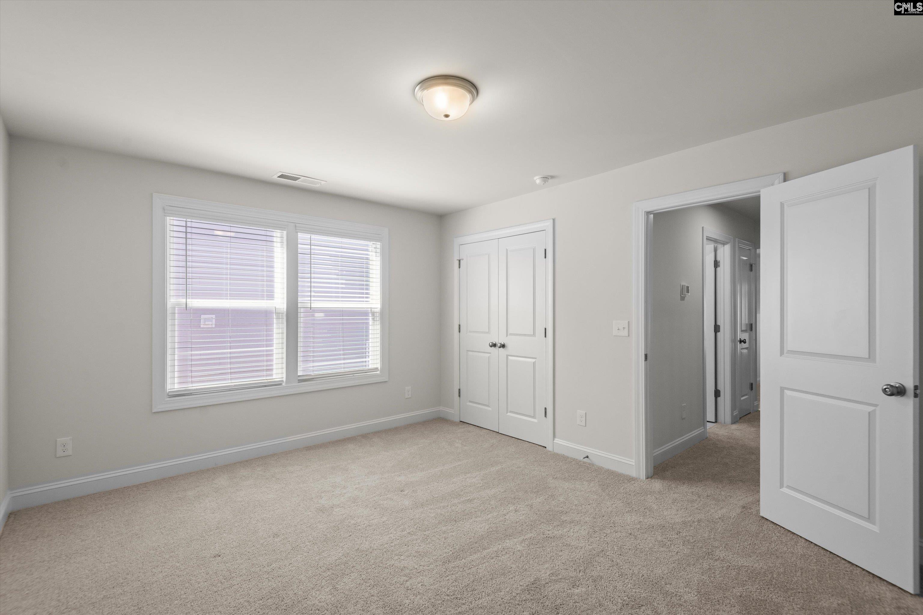 558 Wild Ginger Loop Irmo, SC 29063 - Photo 33 of 42 a view of an empty room with a window