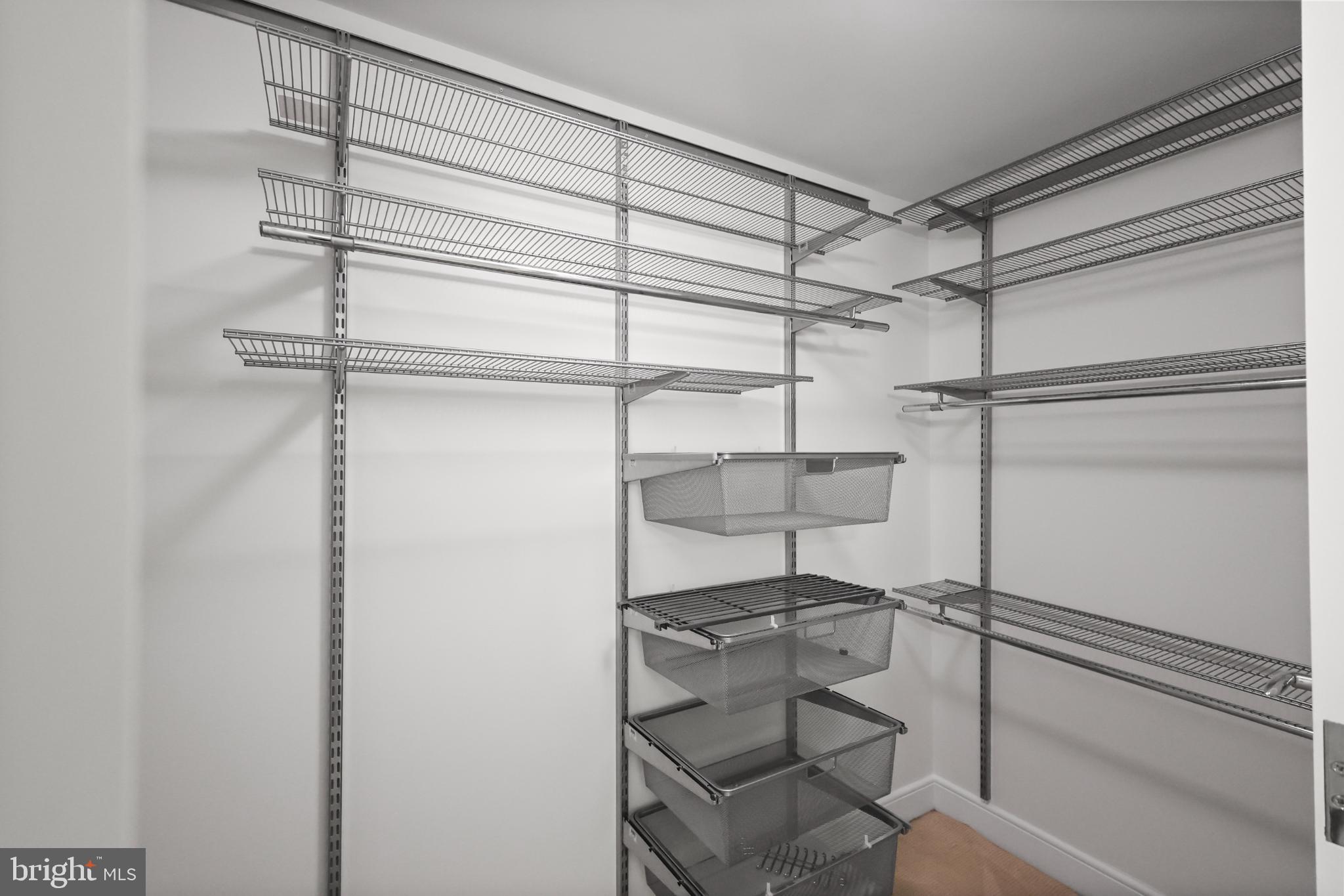 1111 19th Street North, Unit 1707 Arlington, VA 22209 - Photo 20 of 60 Organized storage space in closet