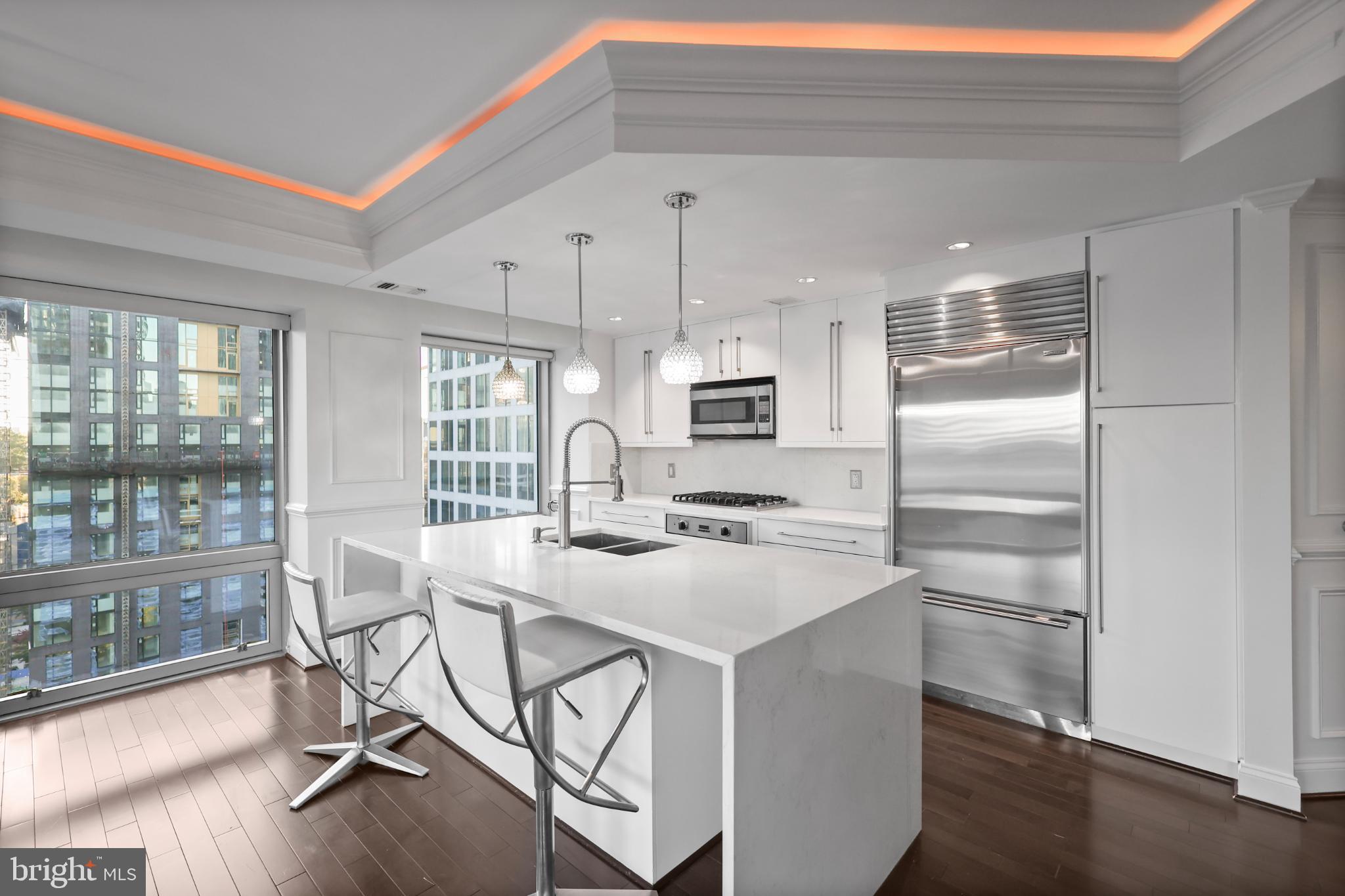 1111 19th Street North, Unit 1707 Arlington, VA 22209 - Photo 4 of 60 Modern kitchen with city views.