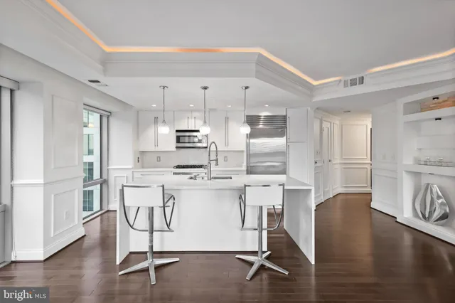 a utility room with washer and dryer