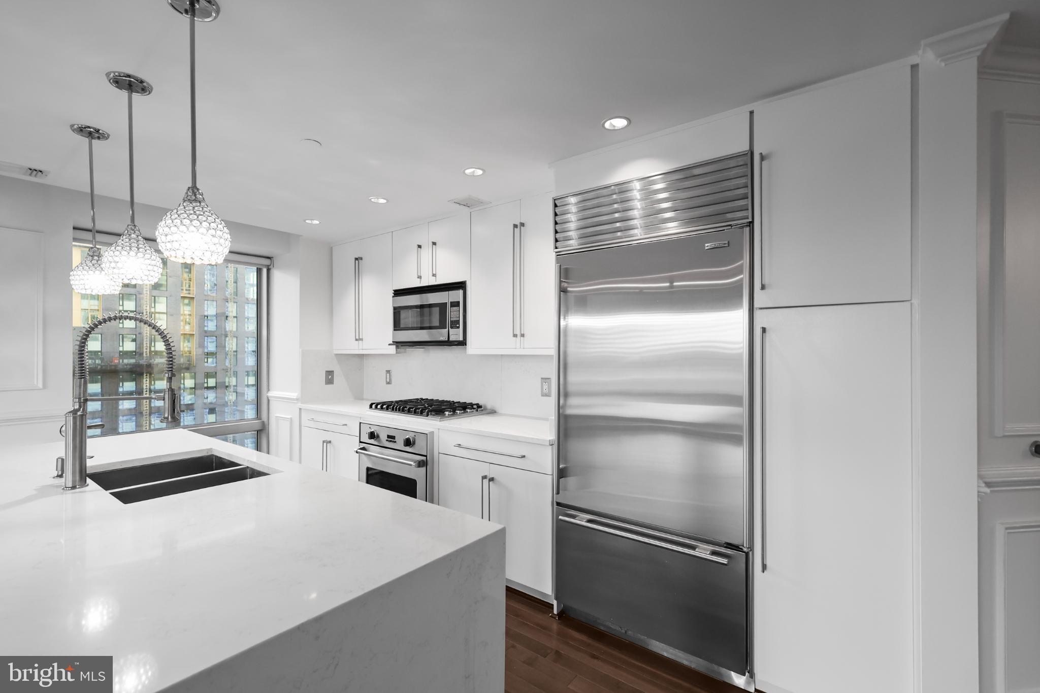 1111 19th Street North, Unit 1707 Arlington, VA 22209 - Photo 10 of 60 Modern kitchen with city views.