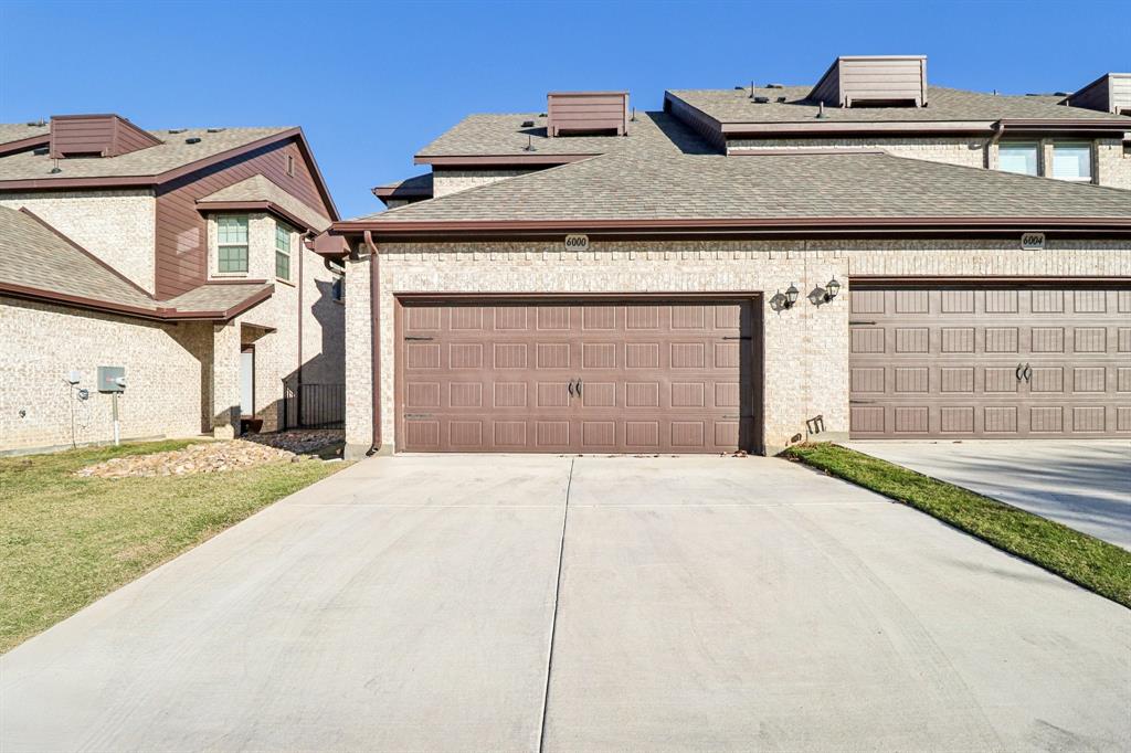 6000 Bursey Road Watauga, TX 76148 - Photo 13 of 13 a front view of a house with a yard and garage