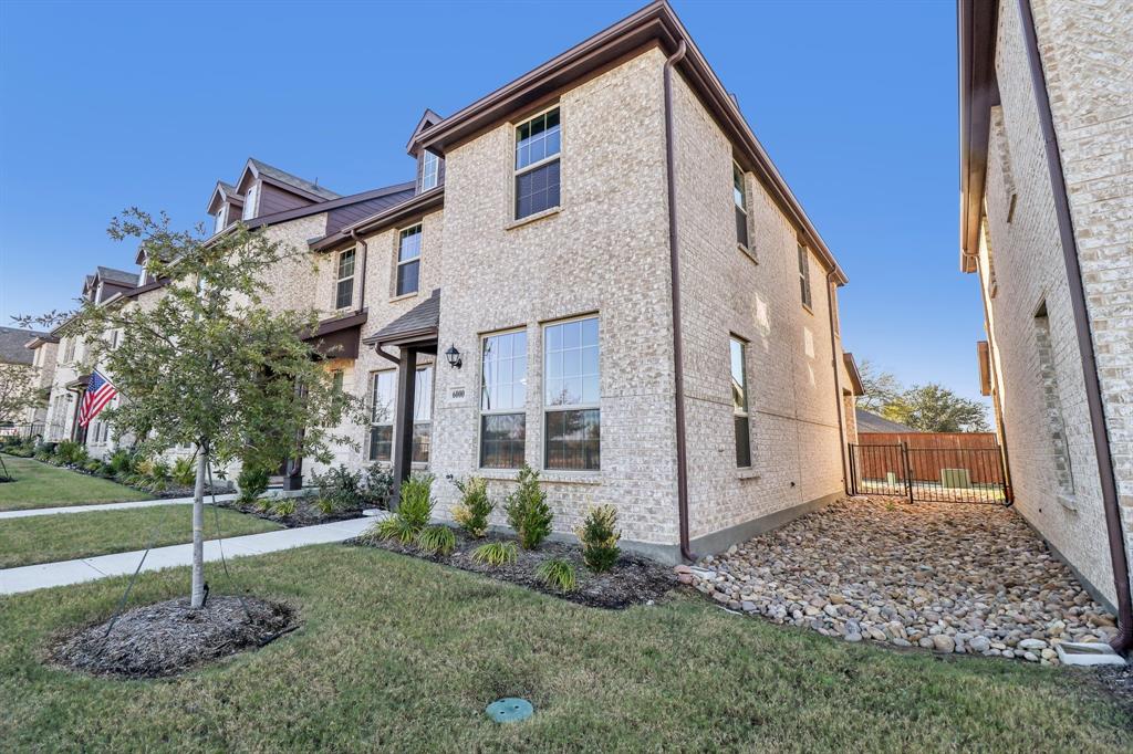 6000 Bursey Road Watauga, TX 76148 - Photo 3 of 13 a front view of a house with garden