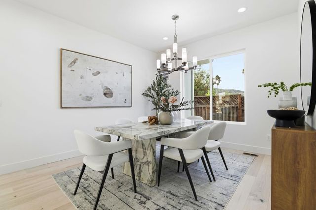 a view of a livingroom with closet and windows