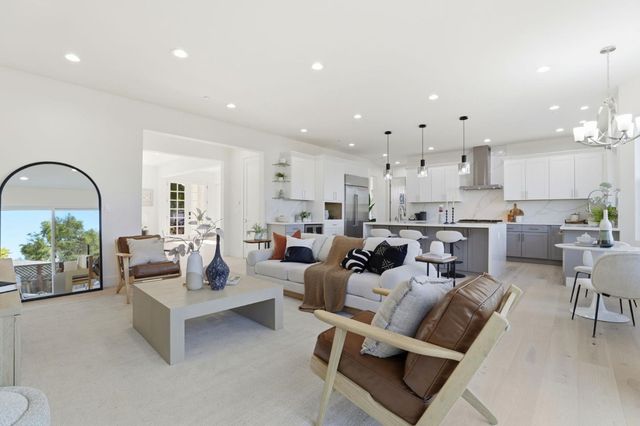 a bedroom with a bed and a night stand