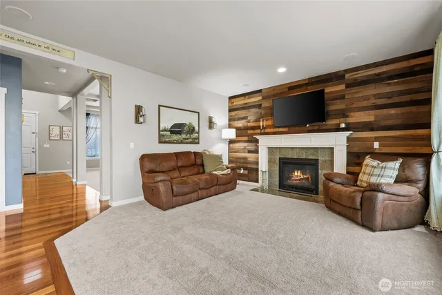 a bathroom with a double vanity sink a mirror and a shower