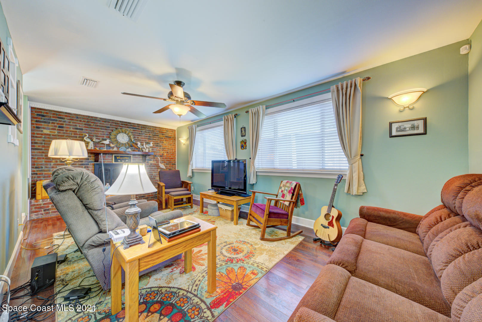 1211 Princeton Road Cocoa, FL 32922 - Photo 6 of 43 living room with wood floor