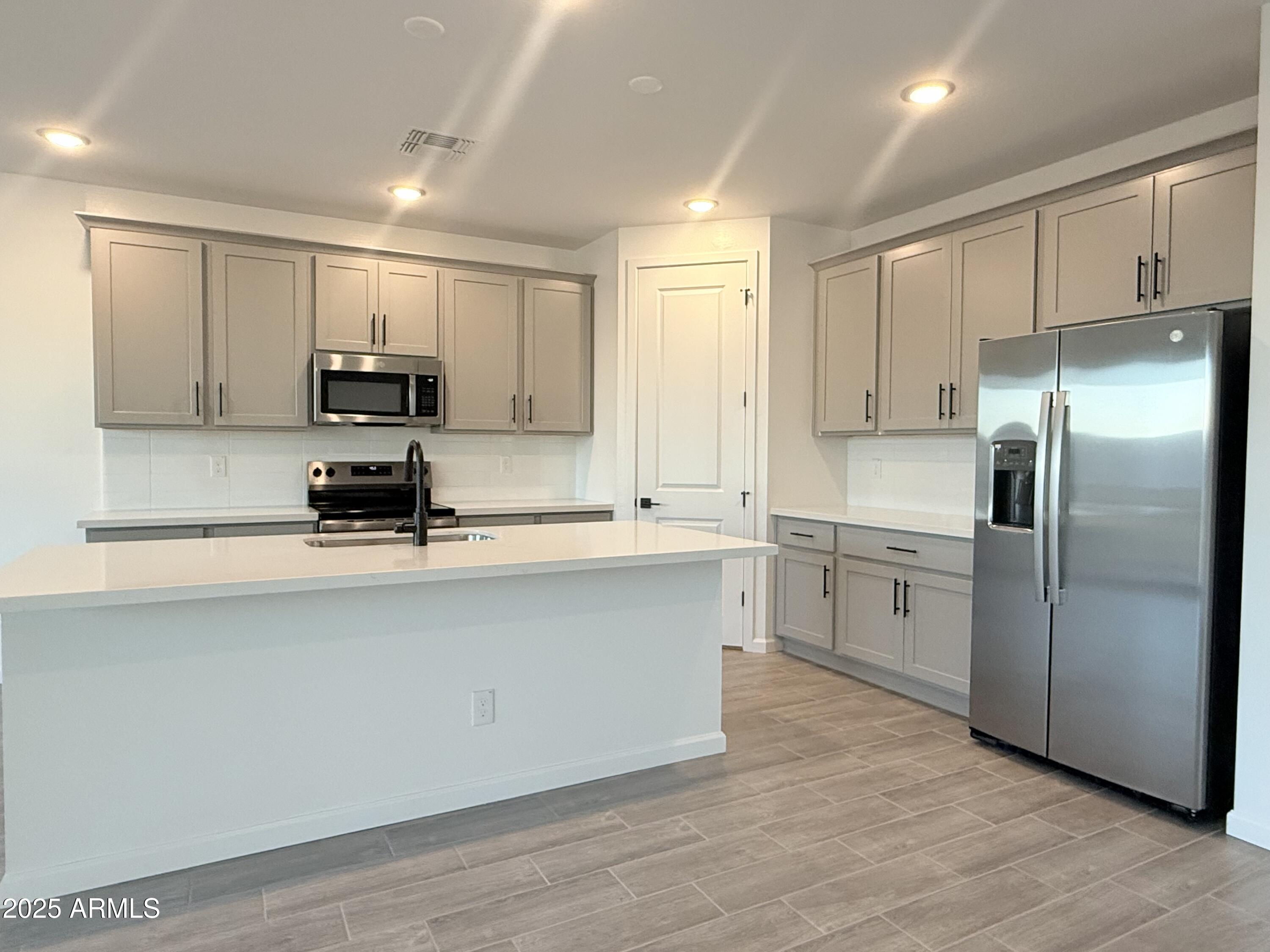 2487 Rolling Pr Lane San Tan Valley, AZ 85140 - Photo 10 of 45 010 Kitchen