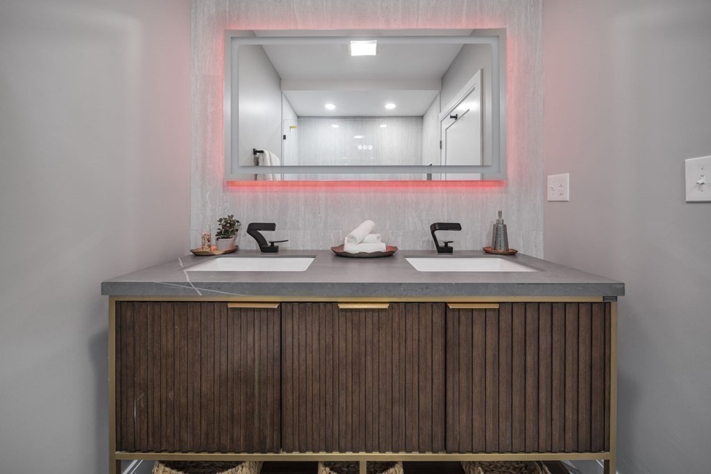 340 Meridian Street, Unit 1 Boston, MA 02128 - Photo 18 of 24 a bathroom with a sink and a mirror