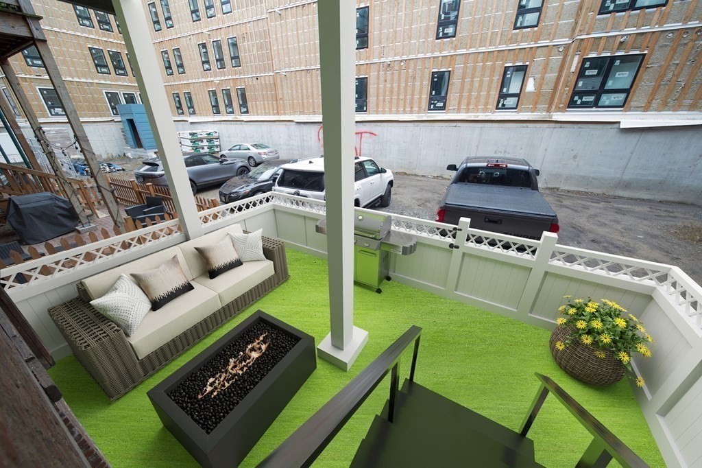 340 Meridian Street, Unit 1 Boston, MA 02128 - Photo 22 of 24 a picture of a living room filled with furniture