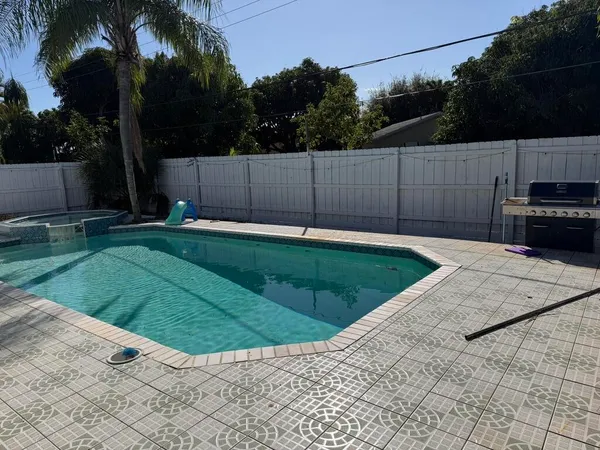 a view of a backyard with a small cabin