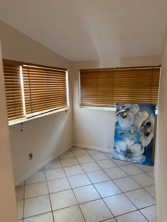 a view of a livingroom with wooden floor
