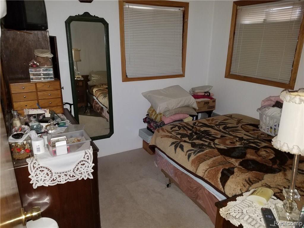 7347 Grove Road Lexington, MI 48450 - Photo 6 of 17 This is a view of the bedroom.