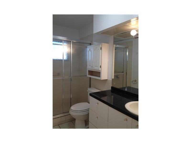 1150 East Sample Road, Unit 109A Pompano Beach, FL 33064 - Photo 8 of 9 Exterior Front