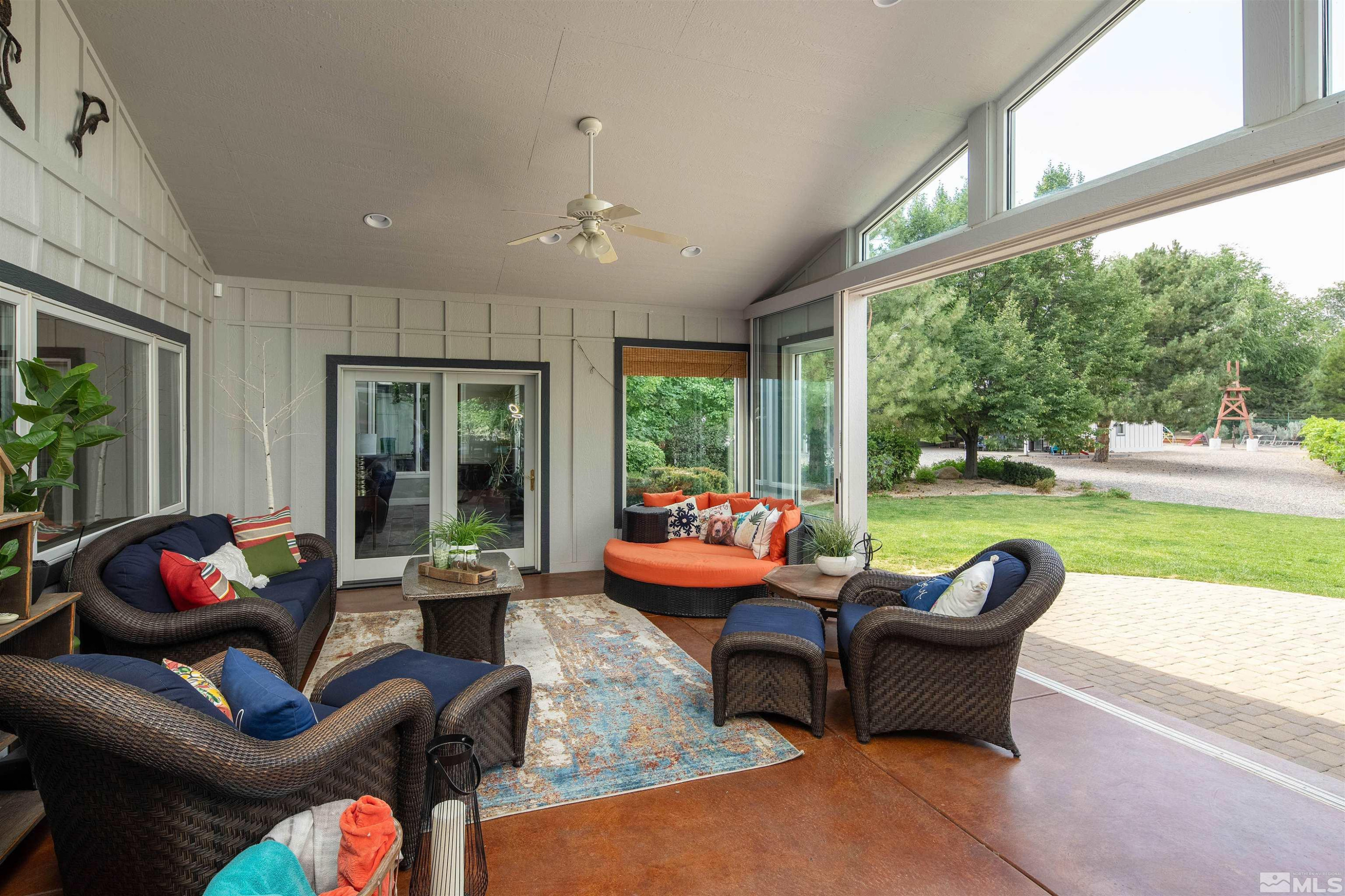 2032 Ash Canyon Road Carson City, NV 89703 - Photo 22 of 37 a outdoor living space with furniture and garden view