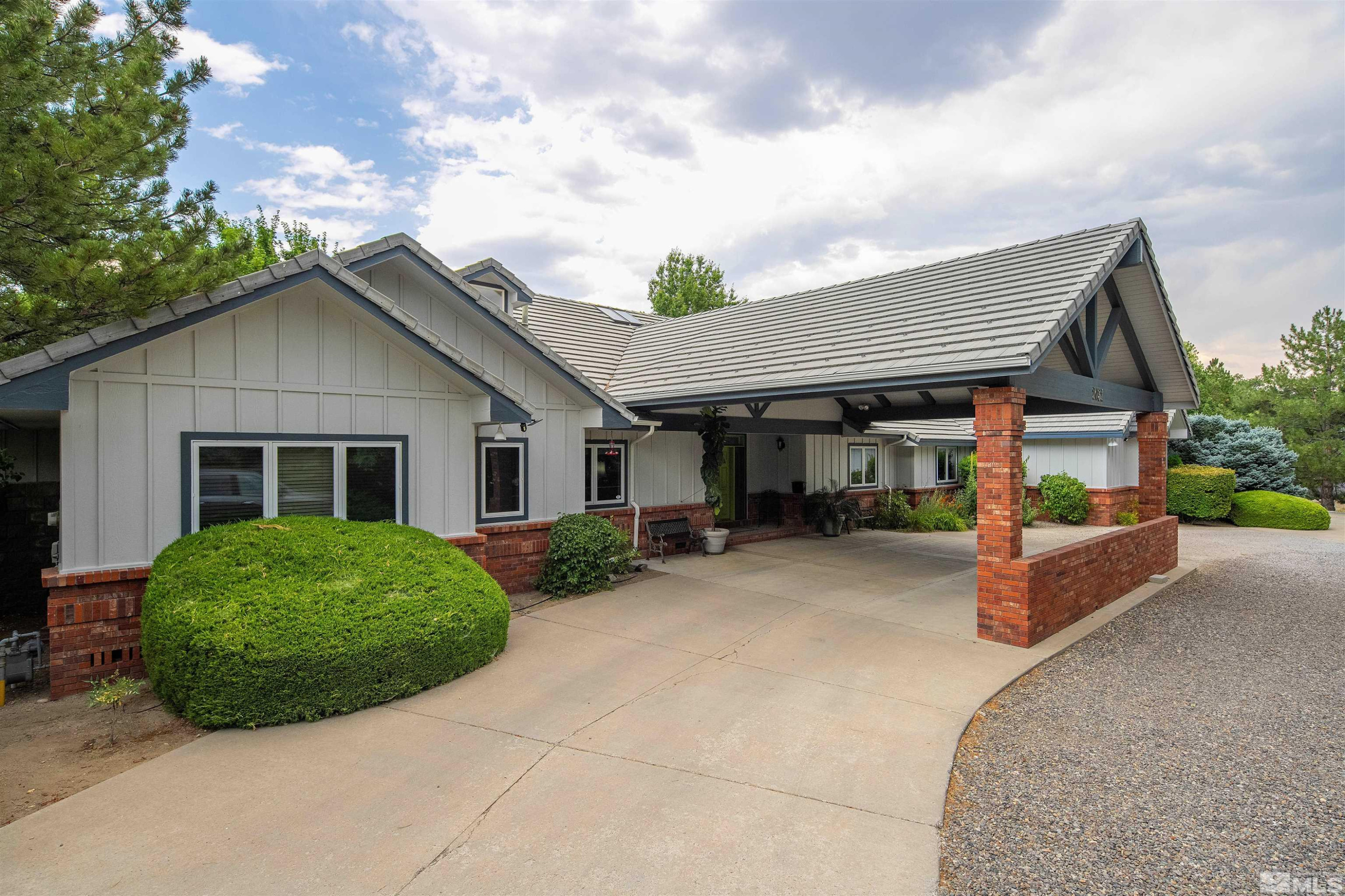 2032 Ash Canyon Road Carson City, NV 89703 - Photo 34 of 37 front view of a house with a patio
