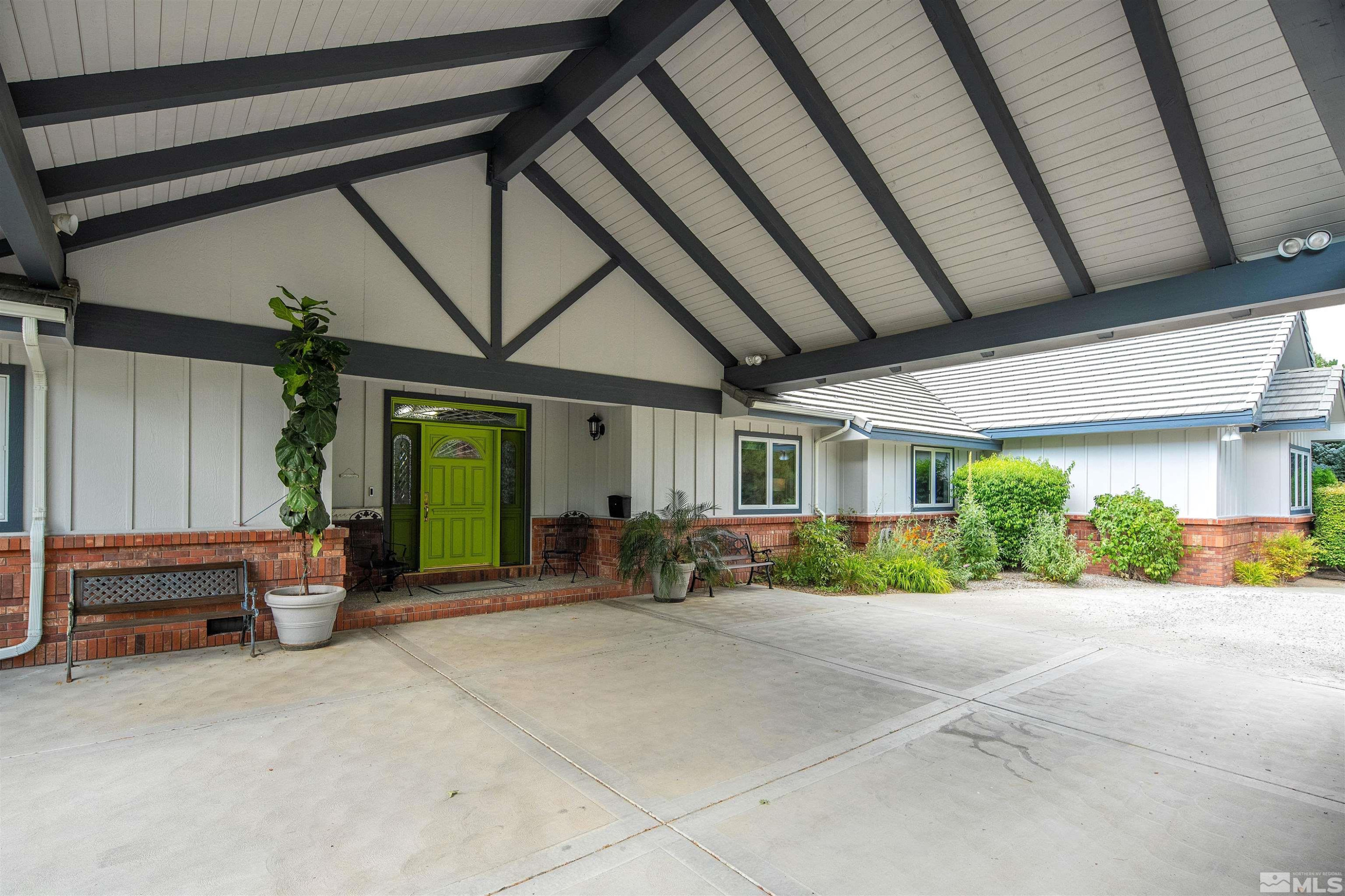 2032 Ash Canyon Road Carson City, NV 89703 - Photo 35 of 37 a view of a house with outdoor space and porch