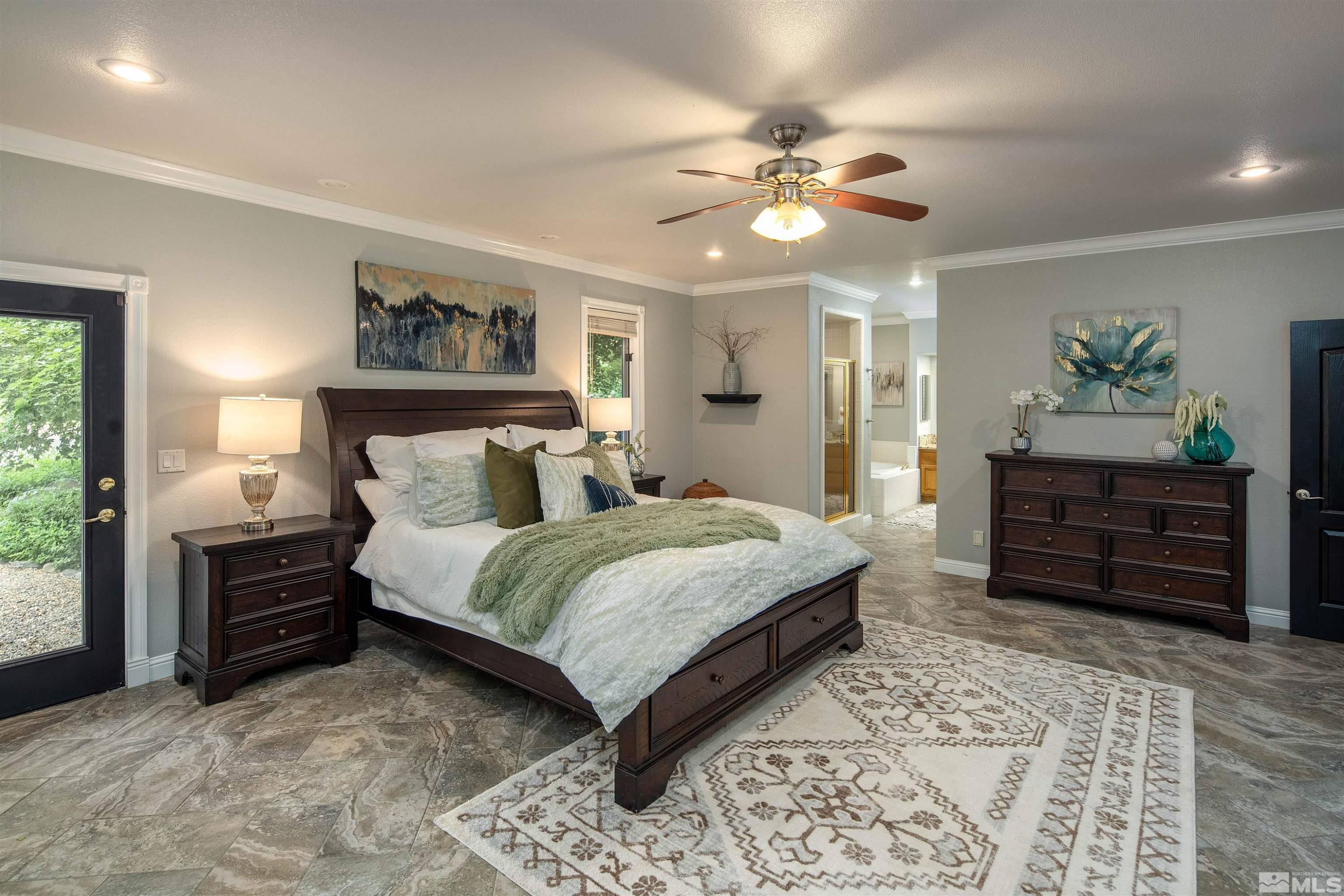 2032 Ash Canyon Road Carson City, NV 89703 - Photo 7 of 37 a bedroom with a bed and dresser