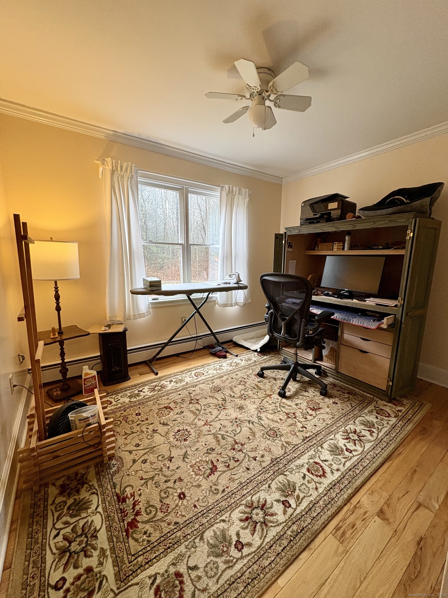 208 Old Forge Road Hartland, CT 06065 - Photo 19 of 36 a view of a workspace with furniture and a window